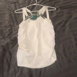 White cache top with beaded detail